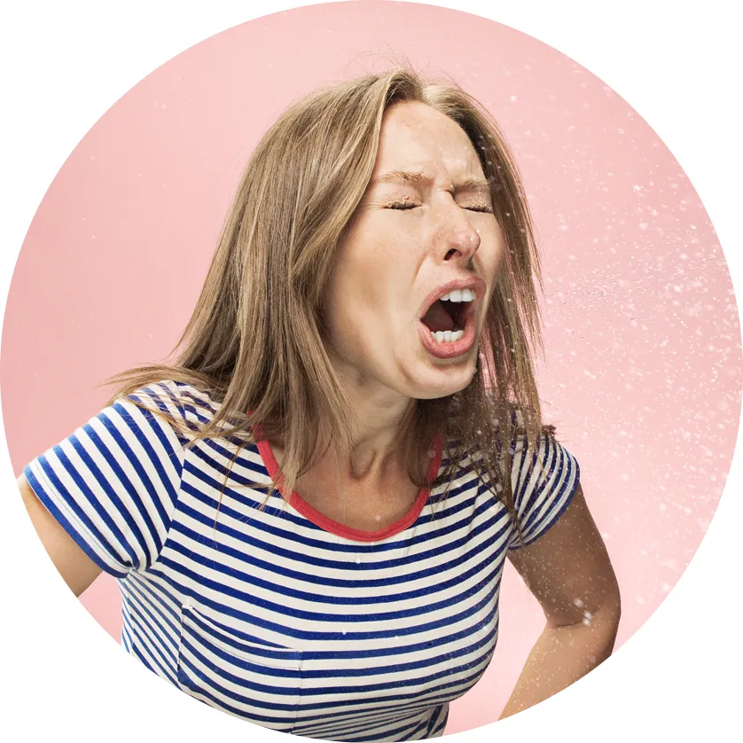 Woman sneezing infected droplets